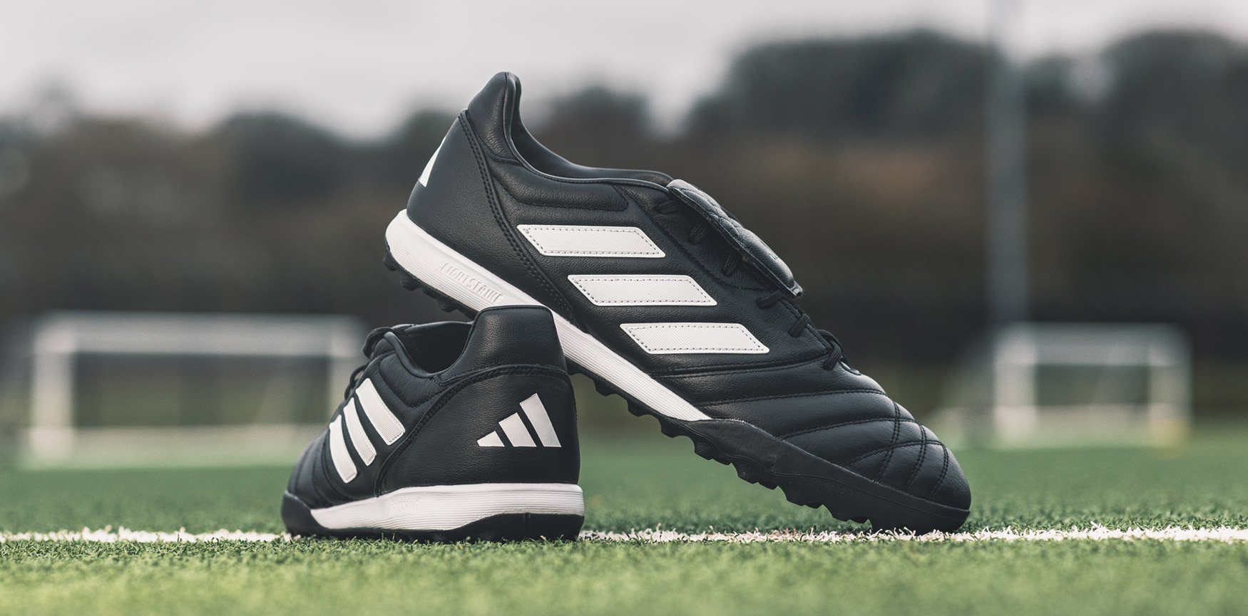 adidas Football Trainers on Astro-Turf Pitch in Black & White